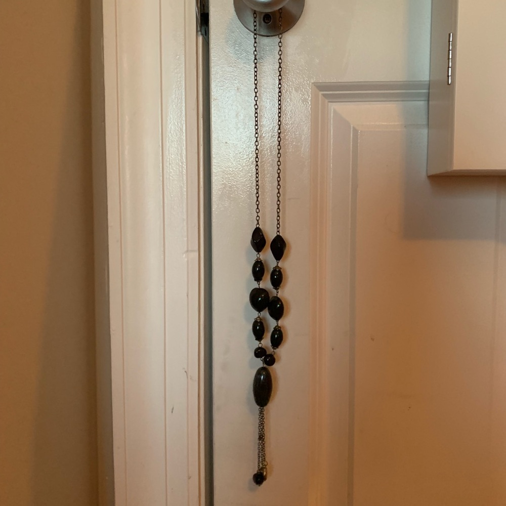 Long black elephant pendent necklace